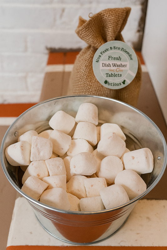 Plastic-free dishwasher tablets in kraft pouch with 30-count label on linen background