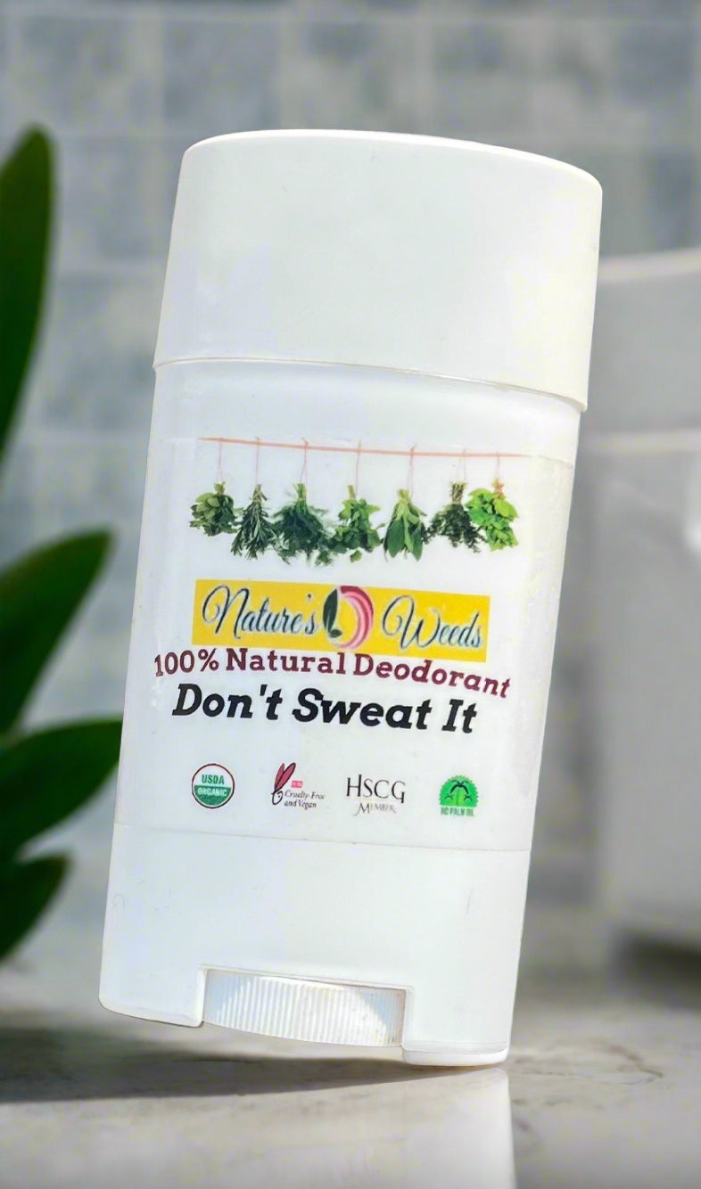Natural aluminum-free deodorant paste in jar with clove and citrus essential oils